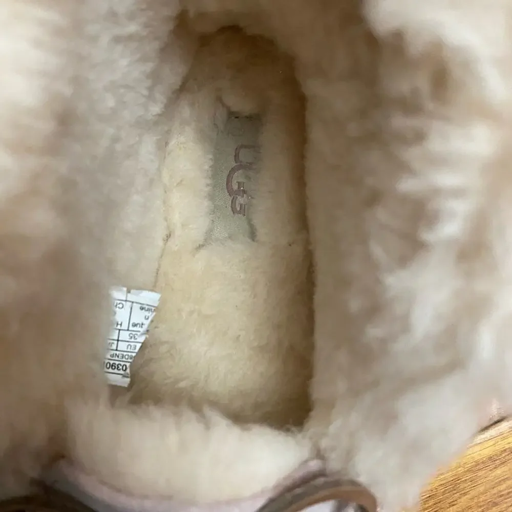 Light pink Ugg slippers in size 3